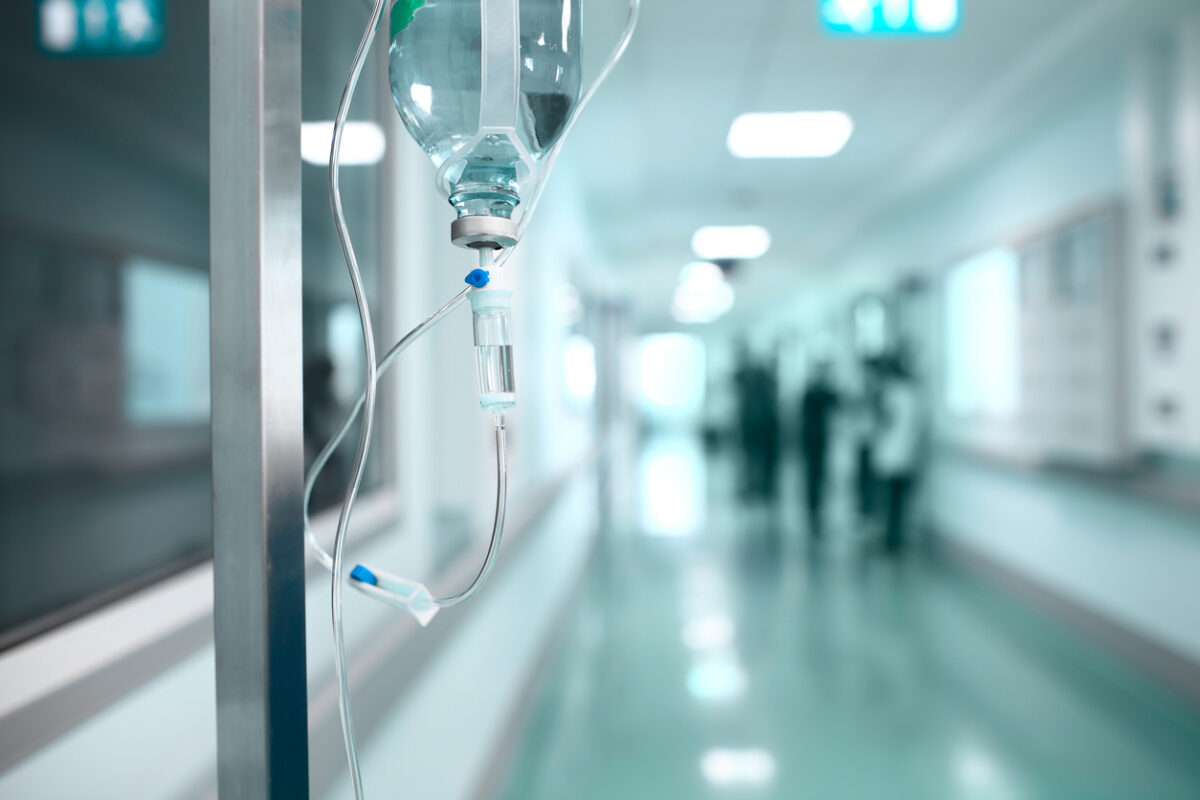 A bag of fluid slowly releases medication into a patient's system